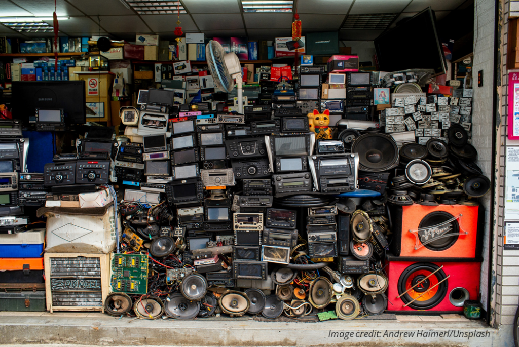 Garage or warehouse packed full of neat stacks of junked audio and video electronics. Image credit: Andrew Haimerl/Unsplash https://unsplash.com/photos/iRE9XAFmnPw